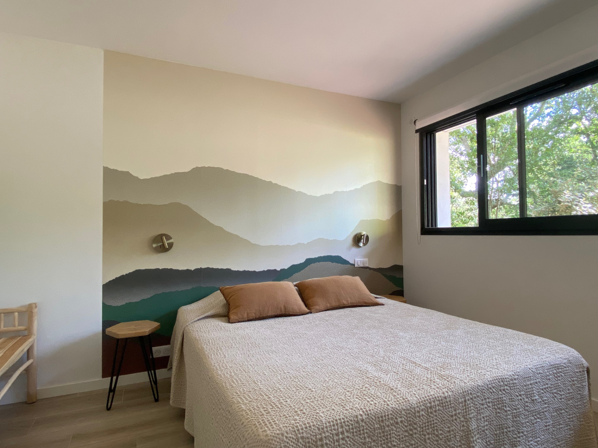 La chambre Sèrra et sa fresque montagne